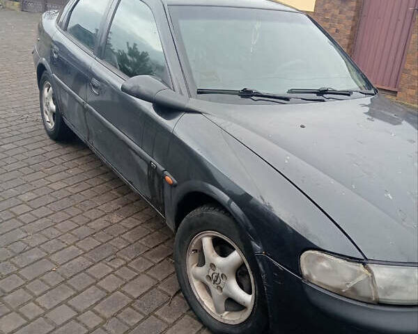 Черный Опель Вектра, объемом двигателя 1.8 л и пробегом 454 тыс. км за 1750 $, фото 2 на Automoto.ua