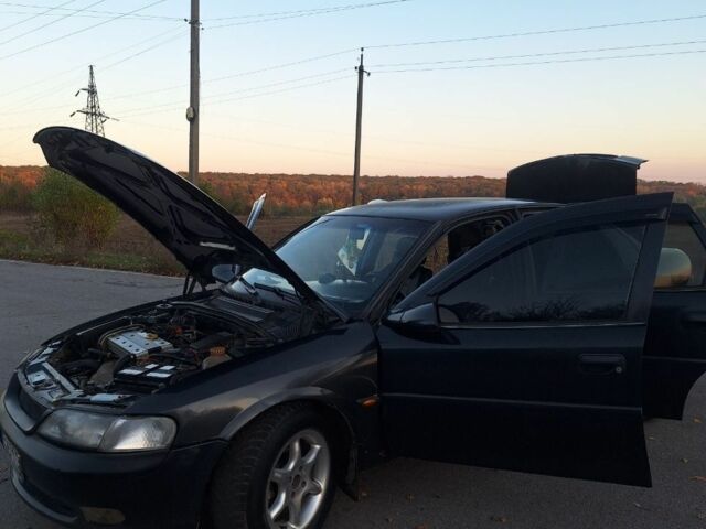 Черный Опель Вектра, объемом двигателя 1.8 л и пробегом 340 тыс. км за 2650 $, фото 14 на Automoto.ua