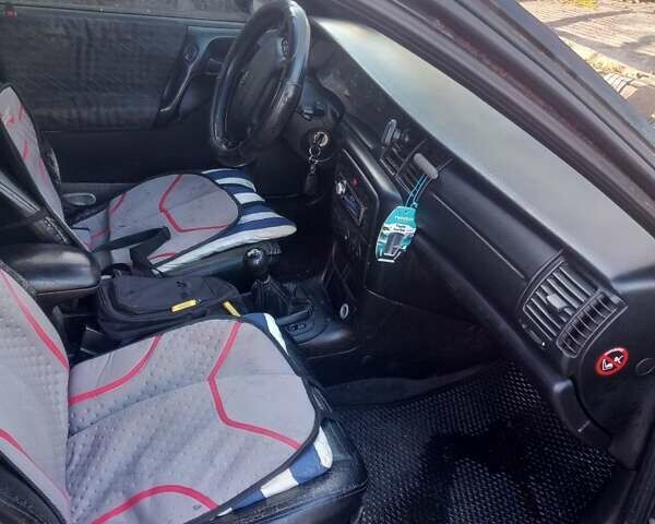 Чорний Опель Вектра, об'ємом двигуна 1.8 л та пробігом 441 тис. км за 1550 $, фото 6 на Automoto.ua