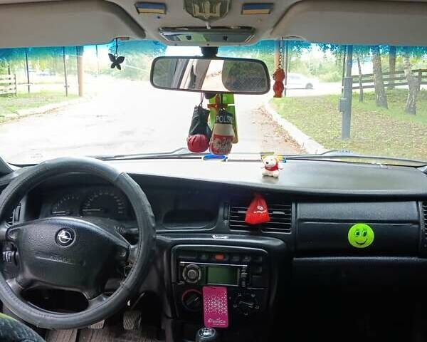 Черный Опель Вектра, объемом двигателя 1.6 л и пробегом 396 тыс. км за 2300 $, фото 18 на Automoto.ua