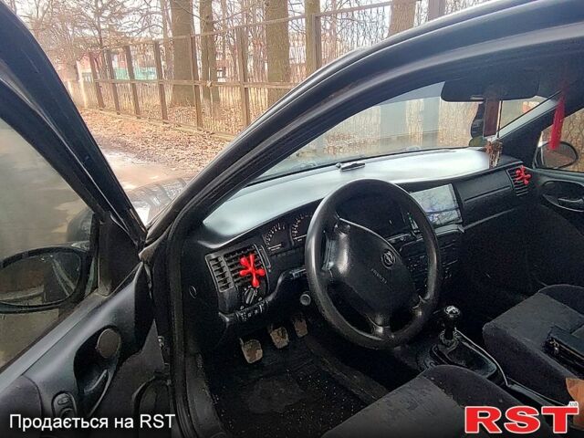 Чорний Опель Вектра, об'ємом двигуна 1.6 л та пробігом 321 тис. км за 2500 $, фото 9 на Automoto.ua