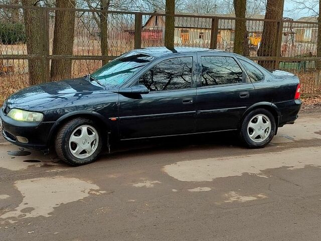 Чорний Опель Вектра, об'ємом двигуна 1.6 л та пробігом 321 тис. км за 2500 $, фото 4 на Automoto.ua