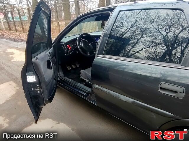 Чорний Опель Вектра, об'ємом двигуна 1.6 л та пробігом 321 тис. км за 2500 $, фото 11 на Automoto.ua