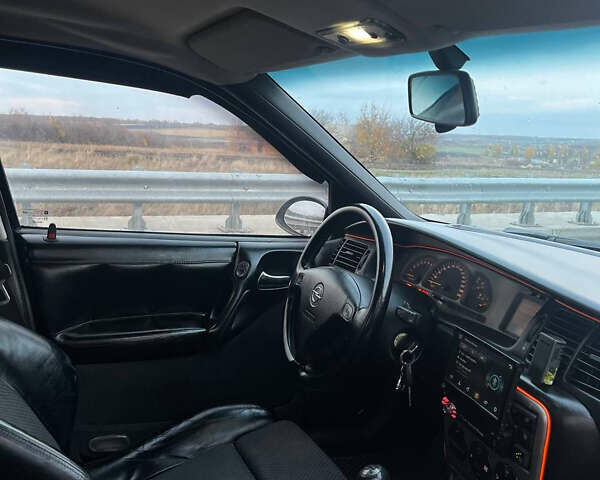 Опель Вектра 1998 в Кобеляках на Automoto.ua Черный Опель Вектра, объемом двигателя 2.5 л и пробегом 303 тыс. км за 5000 $, фото 30 на Automoto.ua