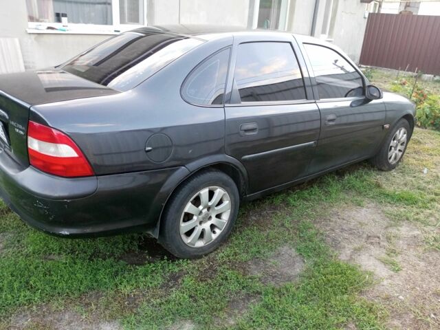 Черный Опель Вектра, объемом двигателя 1.6 л и пробегом 245 тыс. км за 2500 $, фото 2 на Automoto.ua