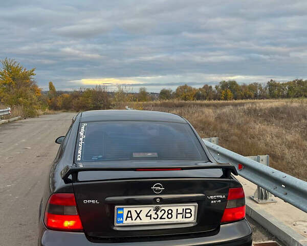 Опель Вектра 1998 в Кобеляках на Automoto.ua Черный Опель Вектра, объемом двигателя 2.5 л и пробегом 303 тыс. км за 5000 $, фото 9 на Automoto.ua