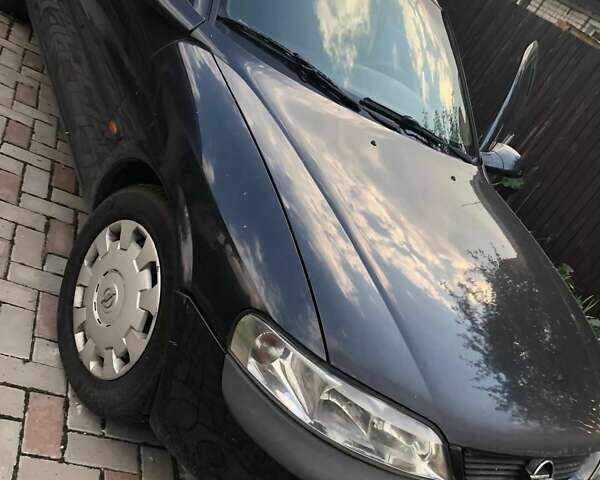 Черный Опель Вектра, объемом двигателя 1.6 л и пробегом 270 тыс. км за 2000 $, фото 9 на Automoto.ua
