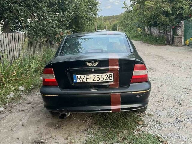 Чорний Опель Вектра, об'ємом двигуна 0 л та пробігом 300 тис. км за 600 $, фото 2 на Automoto.ua