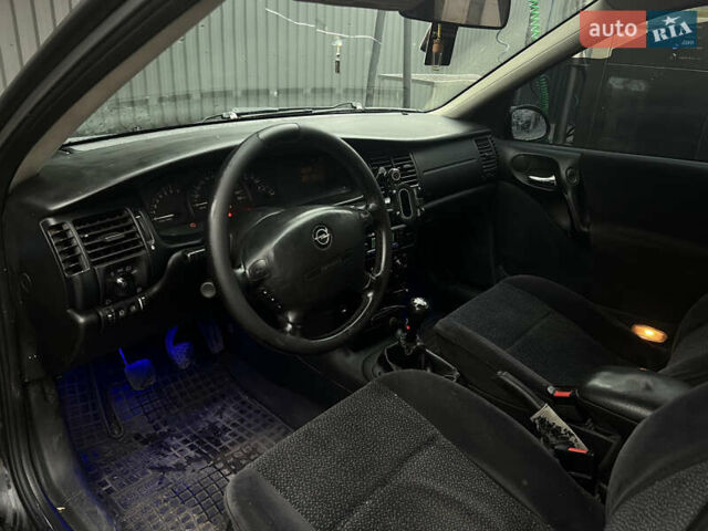 Черный Опель Вектра, объемом двигателя 1.6 л и пробегом 303 тыс. км за 2300 $, фото 7 на Automoto.ua