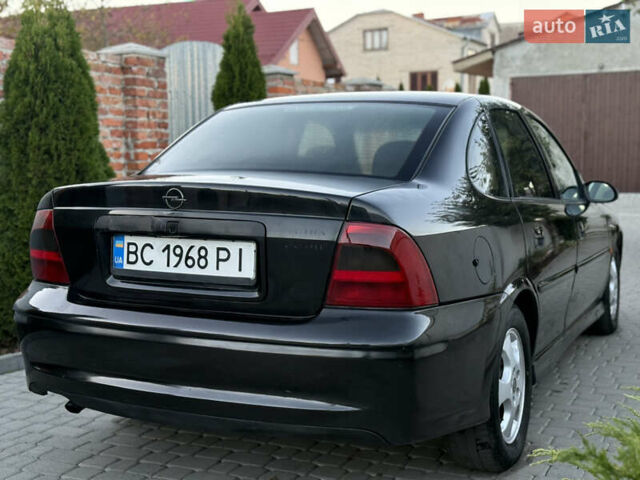 Чорний Опель Вектра, об'ємом двигуна 2.2 л та пробігом 350 тис. км за 1950 $, фото 7 на Automoto.ua