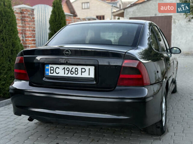 Чорний Опель Вектра, об'ємом двигуна 2.2 л та пробігом 350 тис. км за 1950 $, фото 8 на Automoto.ua