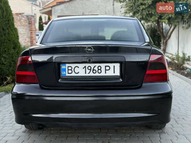 Чорний Опель Вектра, об'ємом двигуна 2.2 л та пробігом 350 тис. км за 1950 $, фото 9 на Automoto.ua