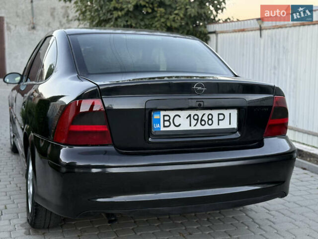 Чорний Опель Вектра, об'ємом двигуна 2.2 л та пробігом 350 тис. км за 1950 $, фото 10 на Automoto.ua