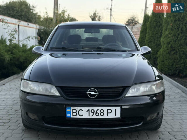 Чорний Опель Вектра, об'ємом двигуна 2.2 л та пробігом 350 тис. км за 1950 $, фото 4 на Automoto.ua