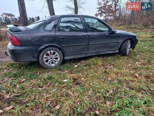 Черный Опель Вектра, объемом двигателя 2 л и пробегом 348 тыс. км за 2200 $, фото 3 на Automoto.ua