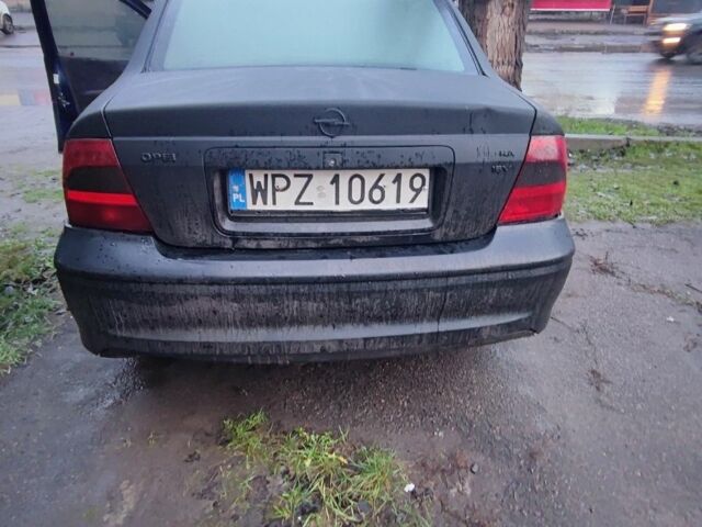 Черный Опель Вектра, объемом двигателя 2 л и пробегом 230 тыс. км за 1705 $, фото 3 на Automoto.ua