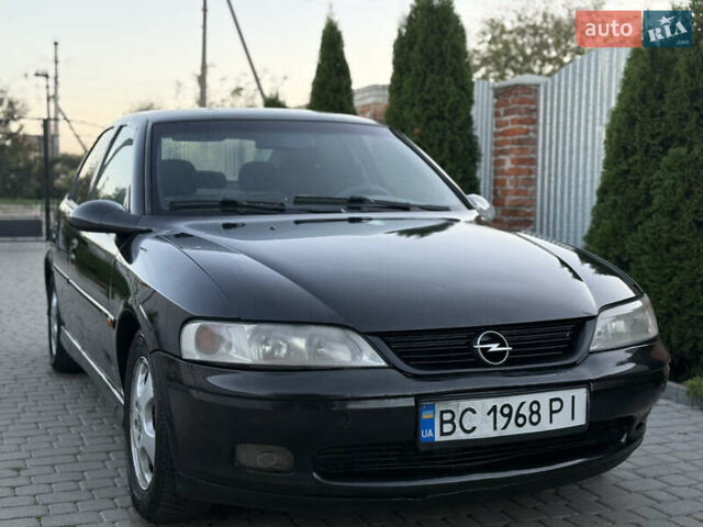 Чорний Опель Вектра, об'ємом двигуна 2.2 л та пробігом 350 тис. км за 1950 $, фото 5 на Automoto.ua