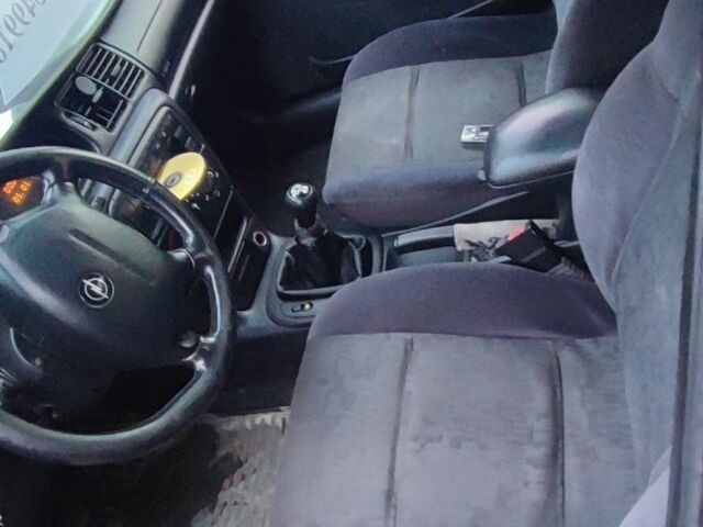 Черный Опель Вектра, объемом двигателя 2 л и пробегом 230 тыс. км за 1705 $, фото 2 на Automoto.ua