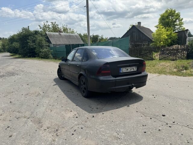 Черный Опель Вектра, объемом двигателя 2 л и пробегом 350 тыс. км за 1250 $, фото 5 на Automoto.ua