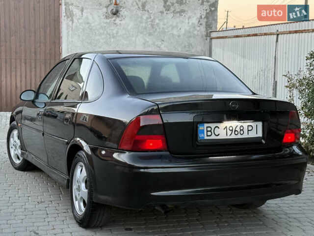Чорний Опель Вектра, об'ємом двигуна 2.2 л та пробігом 350 тис. км за 1950 $, фото 15 на Automoto.ua