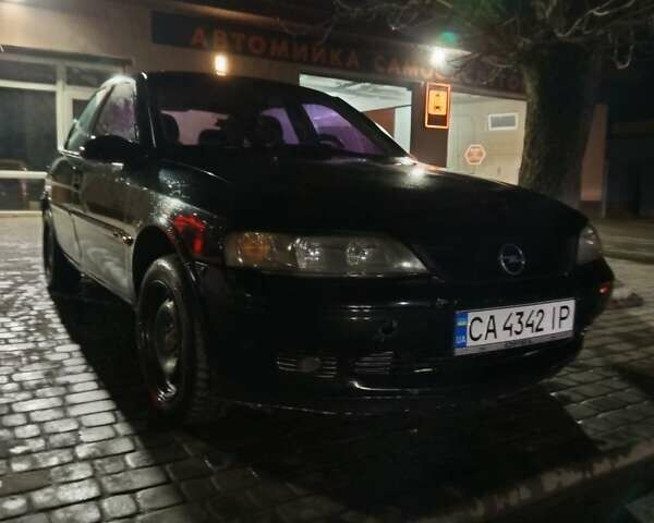 Черный Опель Вектра, объемом двигателя 2 л и пробегом 30 тыс. км за 3500 $, фото 2 на Automoto.ua