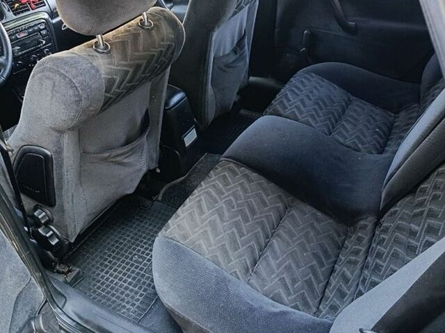 Чорний Опель Вектра, об'ємом двигуна 2 л та пробігом 230 тис. км за 3450 $, фото 2 на Automoto.ua