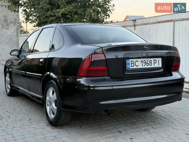 Чорний Опель Вектра, об'ємом двигуна 2.2 л та пробігом 350 тис. км за 1950 $, фото 11 на Automoto.ua