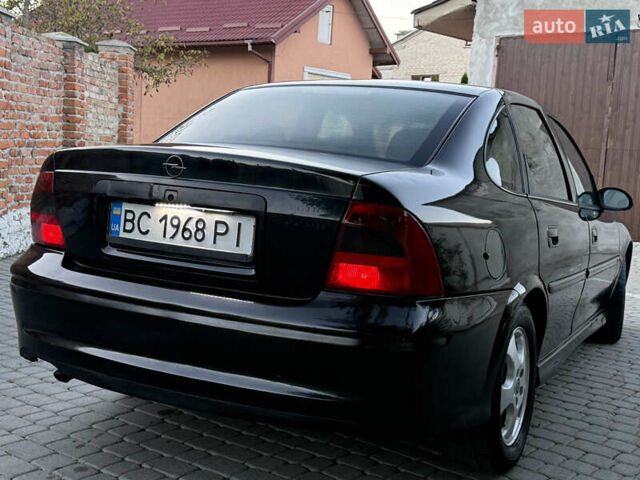 Чорний Опель Вектра, об'ємом двигуна 2.2 л та пробігом 350 тис. км за 1950 $, фото 18 на Automoto.ua