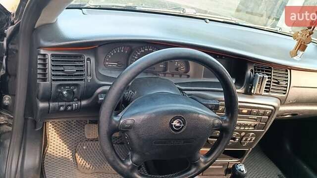 Черный Опель Вектра, объемом двигателя 1.8 л и пробегом 337 тыс. км за 2500 $, фото 10 на Automoto.ua