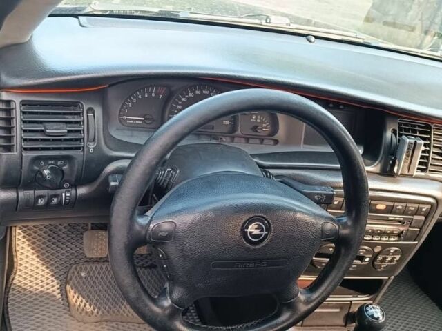 Чорний Опель Вектра, об'ємом двигуна 2 л та пробігом 337 тис. км за 2400 $, фото 5 на Automoto.ua