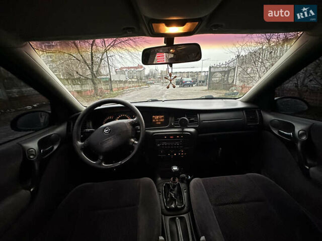 Черный Опель Вектра, объемом двигателя 1.6 л и пробегом 273 тыс. км за 2600 $, фото 7 на Automoto.ua