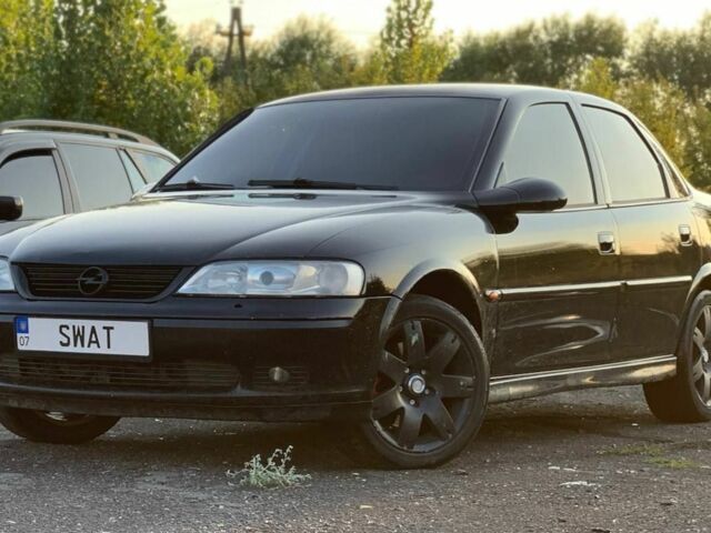 Чорний Опель Вектра, об'ємом двигуна 2 л та пробігом 337 тис. км за 2400 $, фото 1 на Automoto.ua