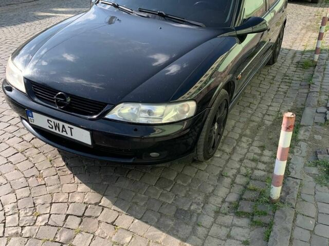 Чорний Опель Вектра, об'ємом двигуна 2 л та пробігом 337 тис. км за 2400 $, фото 2 на Automoto.ua