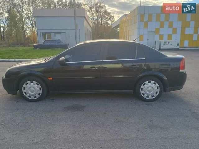 Черный Опель Вектра, объемом двигателя 2.2 л и пробегом 332 тыс. км за 4200 $, фото 7 на Automoto.ua