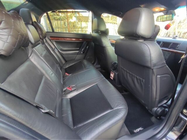 Черный Опель Вектра, объемом двигателя 2.2 л и пробегом 330 тыс. км за 5800 $, фото 8 на Automoto.ua