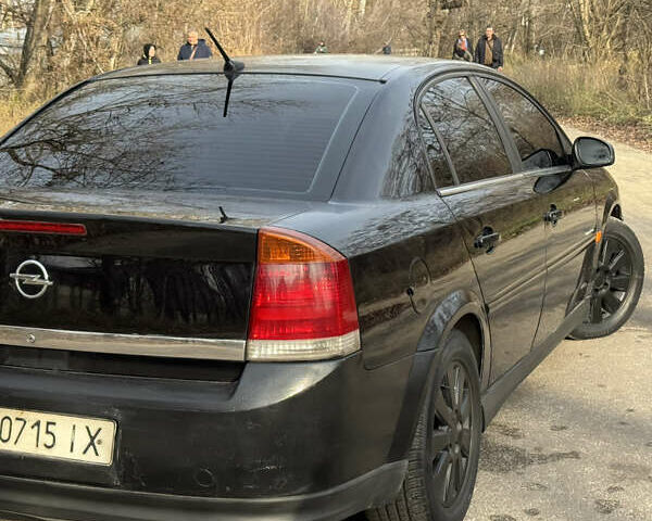Черный Опель Вектра, объемом двигателя 2.2 л и пробегом 300 тыс. км за 3250 $, фото 12 на Automoto.ua