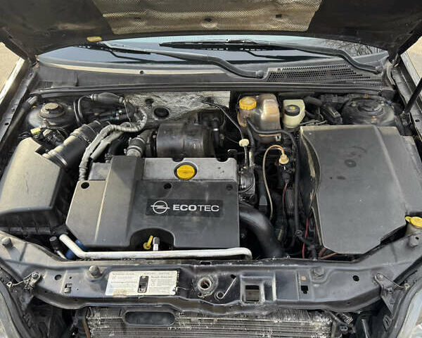 Черный Опель Вектра, объемом двигателя 2.2 л и пробегом 300 тыс. км за 3250 $, фото 28 на Automoto.ua