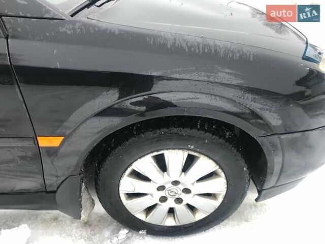 Черный Опель Вектра, объемом двигателя 2.2 л и пробегом 400 тыс. км за 3500 $, фото 10 на Automoto.ua