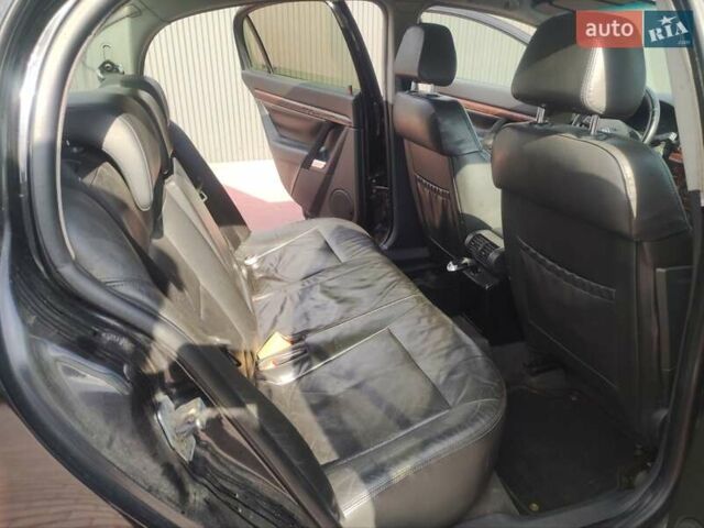 Черный Опель Вектра, объемом двигателя 2.2 л и пробегом 222 тыс. км за 3000 $, фото 7 на Automoto.ua