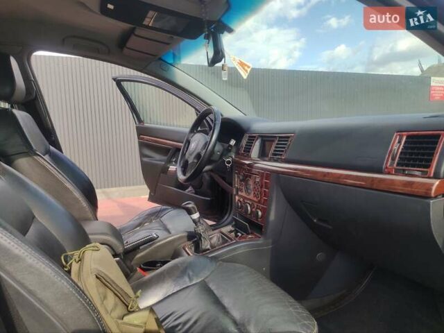 Черный Опель Вектра, объемом двигателя 2.2 л и пробегом 222 тыс. км за 3000 $, фото 6 на Automoto.ua