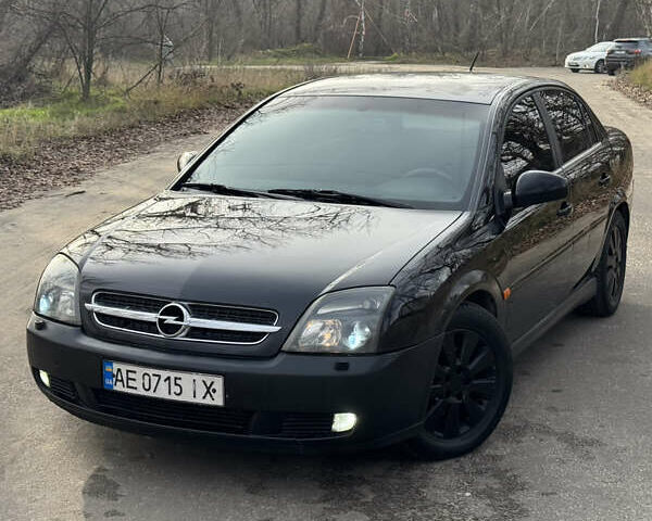 Черный Опель Вектра, объемом двигателя 2.2 л и пробегом 300 тыс. км за 3250 $, фото 1 на Automoto.ua