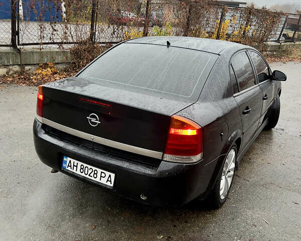Черный Опель Вектра, объемом двигателя 2.2 л и пробегом 240 тыс. км за 3600 $, фото 4 на Automoto.ua