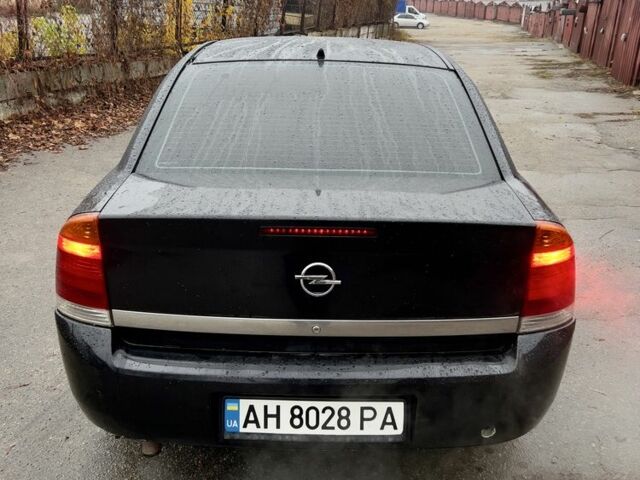 Черный Опель Вектра, объемом двигателя 2.2 л и пробегом 230 тыс. км за 3600 $, фото 5 на Automoto.ua