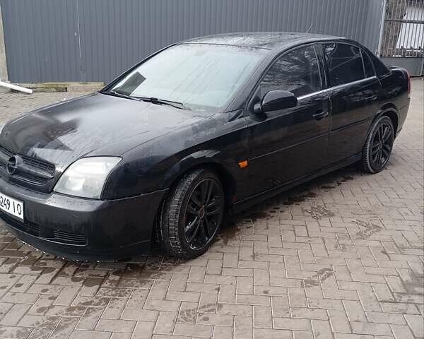 Черный Опель Вектра, объемом двигателя 2.2 л и пробегом 300 тыс. км за 3000 $, фото 5 на Automoto.ua