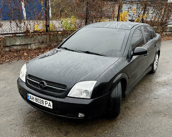 Черный Опель Вектра, объемом двигателя 2.2 л и пробегом 240 тыс. км за 3600 $, фото 3 на Automoto.ua