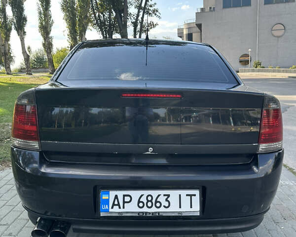 Черный Опель Вектра, объемом двигателя 2.2 л и пробегом 268 тыс. км за 4900 $, фото 5 на Automoto.ua