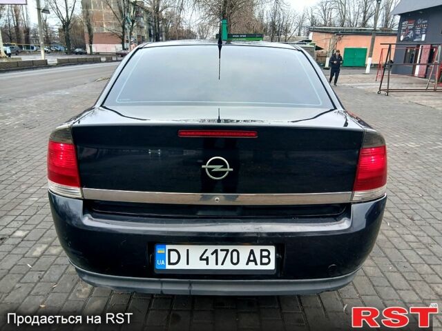 Чорний Опель Вектра, об'ємом двигуна 2.2 л та пробігом 200 тис. км за 3450 $, фото 1 на Automoto.ua