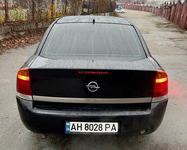 Черный Опель Вектра, объемом двигателя 2.2 л и пробегом 240 тыс. км за 3600 $, фото 5 на Automoto.ua