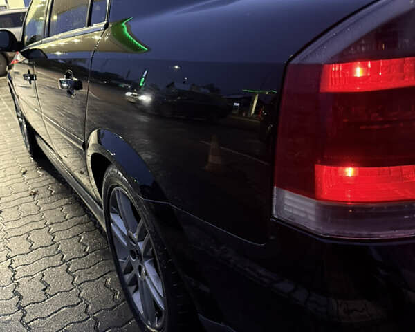 Черный Опель Вектра, объемом двигателя 2.2 л и пробегом 240 тыс. км за 5500 $, фото 6 на Automoto.ua