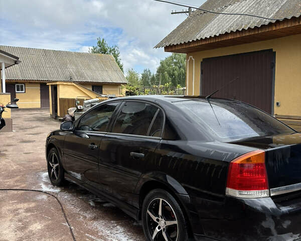 Черный Опель Вектра, объемом двигателя 2.2 л и пробегом 262 тыс. км за 3800 $, фото 4 на Automoto.ua